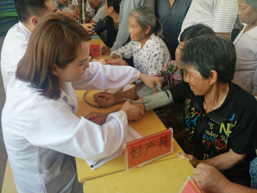 倾心帮扶义诊 行动情暖民心 倾心帮扶义诊 行动情暖民心